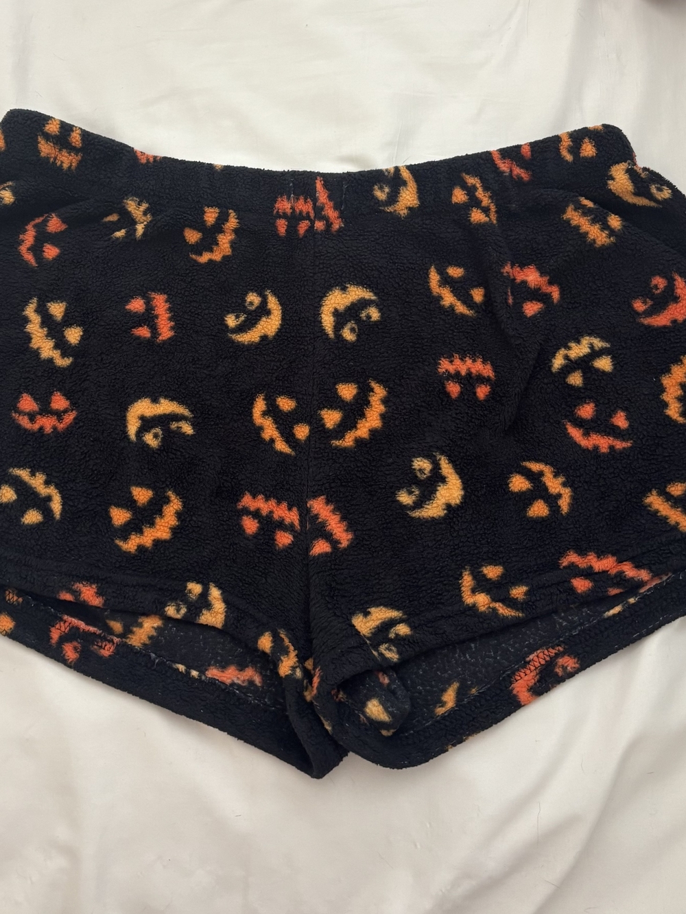 Womens Black Fleece Shorts with Orange Pumpkin Print